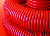 DKC Двустенная труба ПНД гибкая для кабельной канализации д.110мм с протяжкой, SN8, 680Н,  в бухте 100м, цвет красный 121911100 фото